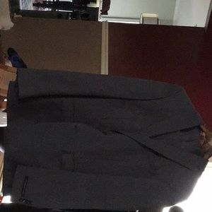 Men’s Suit by John Varvatos. New with tags Blueish/Grey color Size 42L/36W